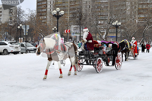 Image of Festive drivings in the carriage with Father Frost.