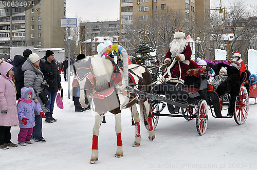 Image of Festive drivings in the carriage with Father Frost