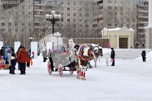 Image of Festive drivings in the carriage with Father Frost