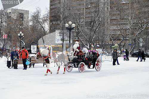 Image of Festive drivings in the carriage with Father Frost.