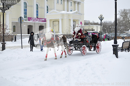 Image of Festive drivings in the carriage with Father Frost.