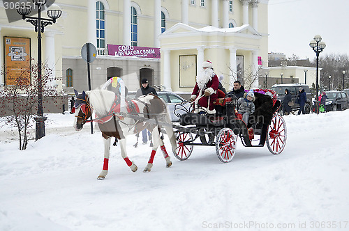 Image of Festive drivings in the carriage with Father Frost.