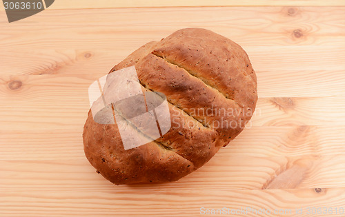 Image of Freshly baked loaf of multi seed malted bread 