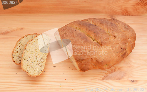 Image of Two slices of bread cut from a fresh loaf 