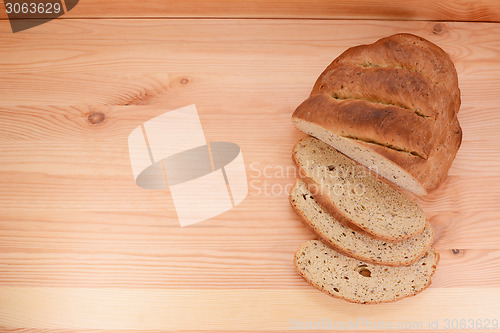 Image of Fresh bread and cut slices 