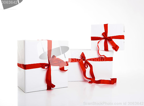 Image of white gift box with nice ribbon