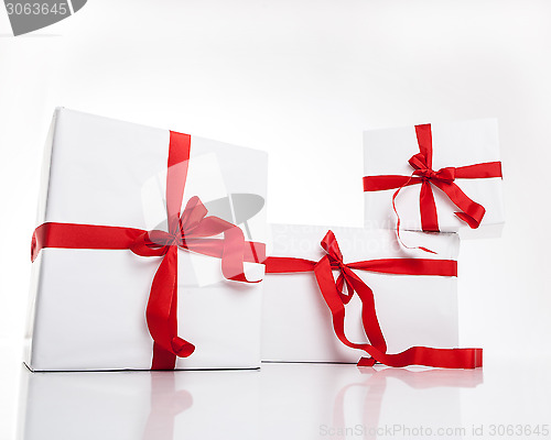 Image of white gift box with nice ribbon