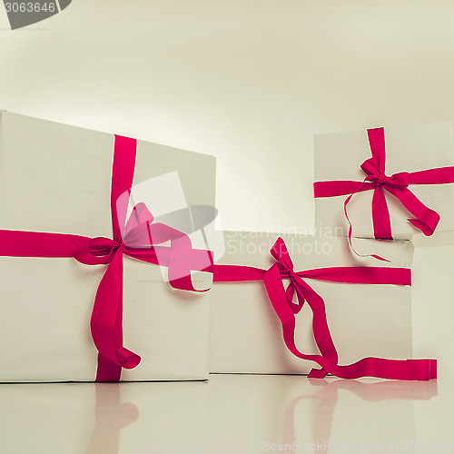 Image of white gift box with nice ribbon