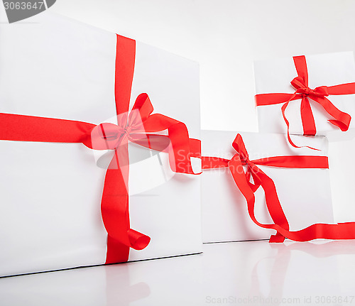 Image of white gift box with nice ribbon