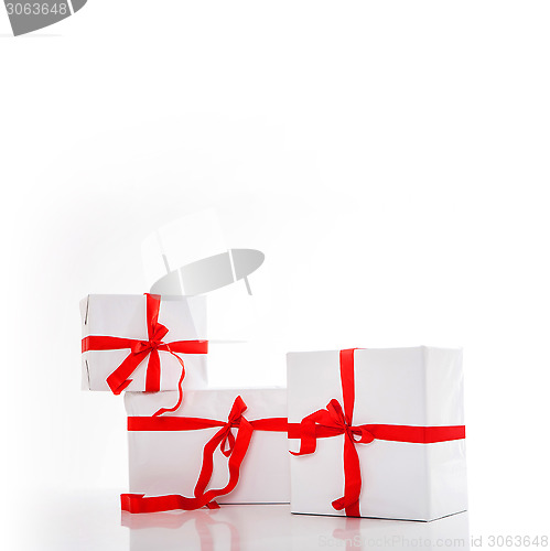 Image of white gift box with nice ribbon