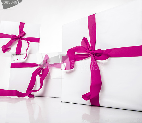 Image of white gift box with nice ribbon