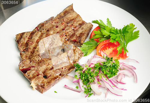 Image of fried beef liver with vegetables
