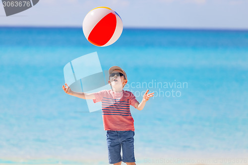 Image of boy playing with the ball