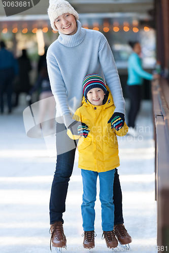 Image of family ice skating