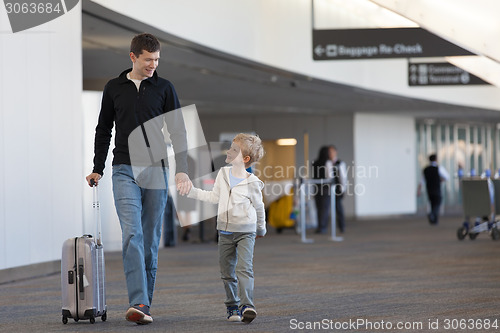Image of family at the airport