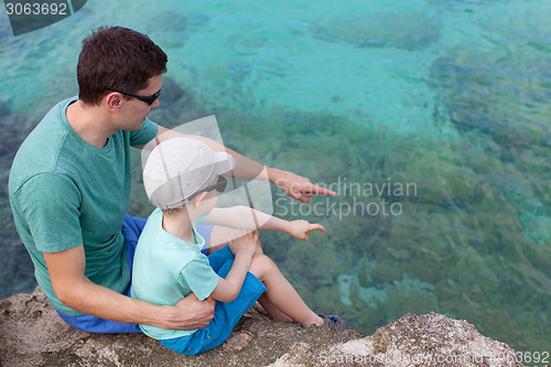 Image of family at sea