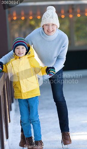 Image of family ice skating