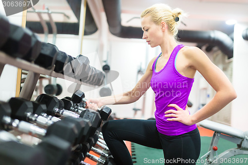 Image of Lady in  gym studio.