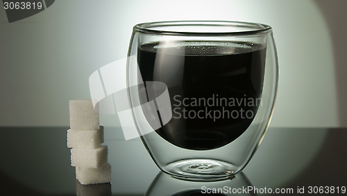 Image of a glass with cola