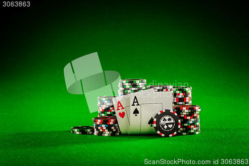 Image of chips and two aces