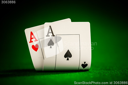 Image of chips and two aces