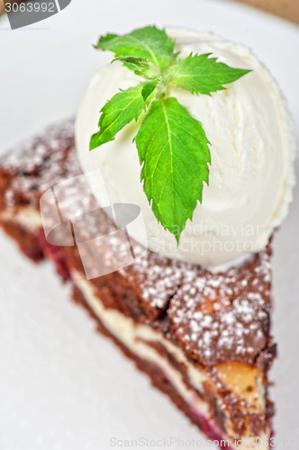 Image of chocolate cake with jam ice cream