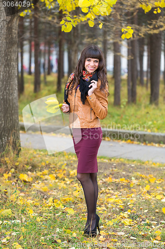 Image of Slim pretty girl in an autumn forest