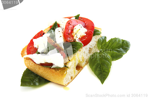 Image of Ciabatta with tomato and cheese.