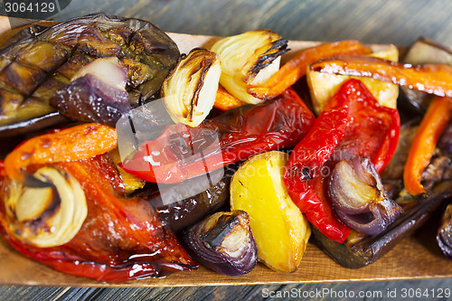 Image of Grilled vegetables in wooden bowl.