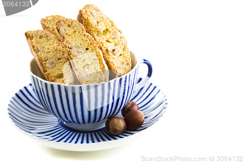 Image of Biscotti in a blue cup.