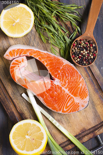 Image of Salmon, lemon and spices closeup.