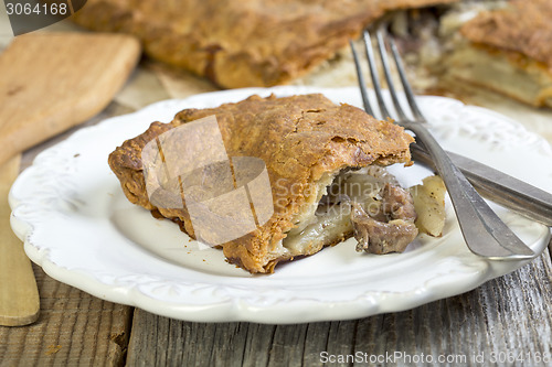 Image of Piece of cake with meat.