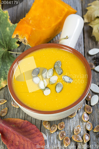 Image of Bowl with traditional pumpkin soup.