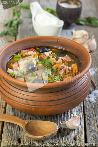 Image of Traditional Russian soup made from several types of meat. Solyan