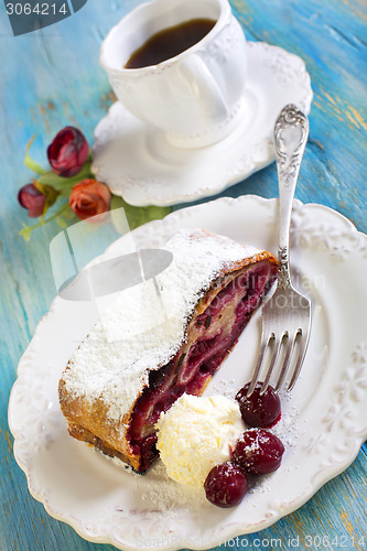 Image of Cherry strudel and coffee.