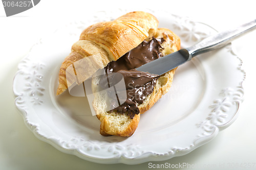 Image of Croissant with chocolate paste.