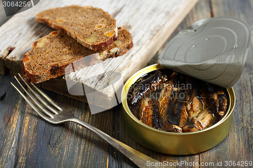 Image of Sprats and black bread.