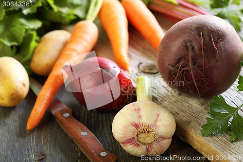 Image of Beets, garlic and knife.