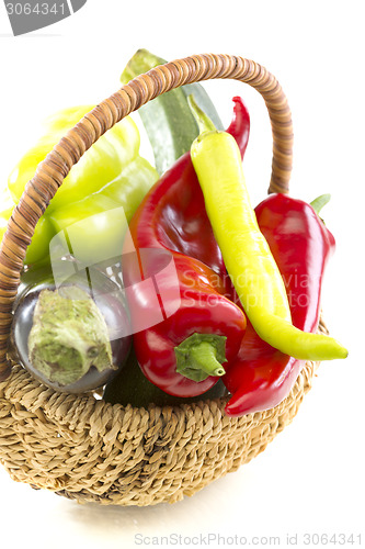 Image of Basket with vegetables.
