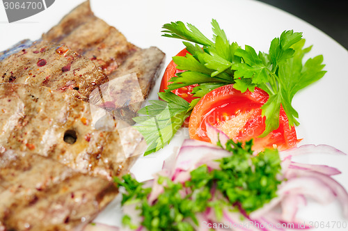 Image of fried beef liver with vegetables