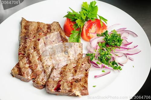 Image of fried beef liver with vegetables