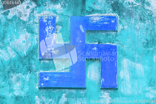 Image of NHA TRANG, VIETNAM 31 JULY 2012 - Swastika symbol on an ancient 