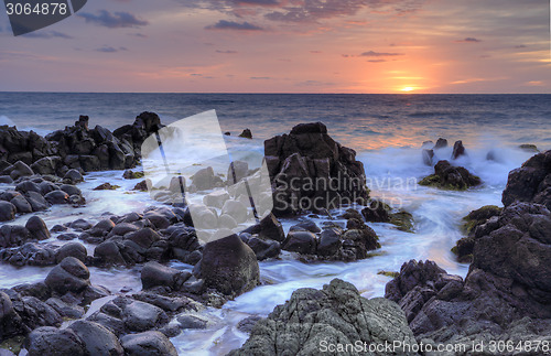 Image of Sunrise and Minamurra volcanic rocks at low tide