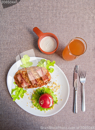 Image of veal meat with bacon