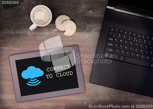 Image of Cloud-computing connection on a digital tablet pc