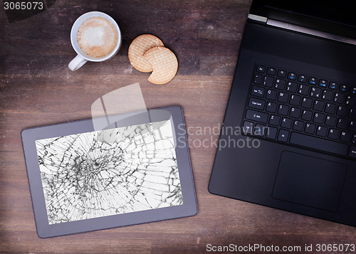 Image of Tablet computer with broken glass