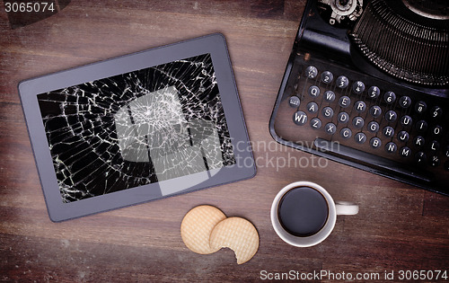 Image of Tablet computer with broken glass