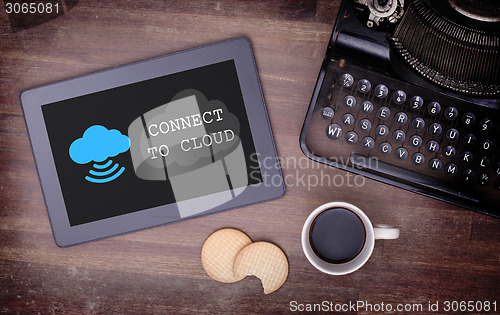 Image of Cloud-computing connection on a digital tablet pc