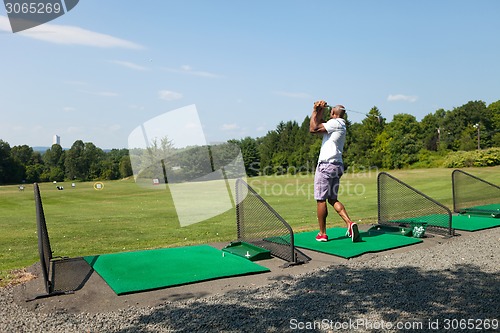 Image of Golfing at the Range