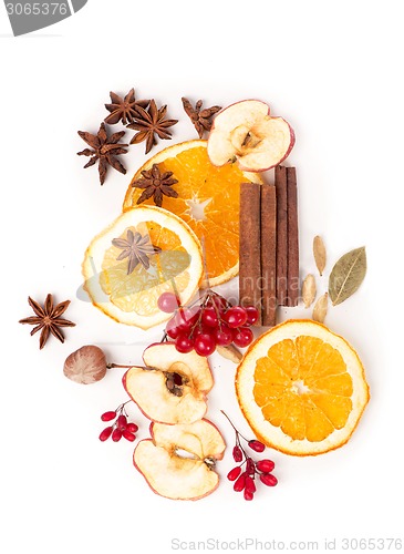 Image of Christmas spices and dried orange sliceson 